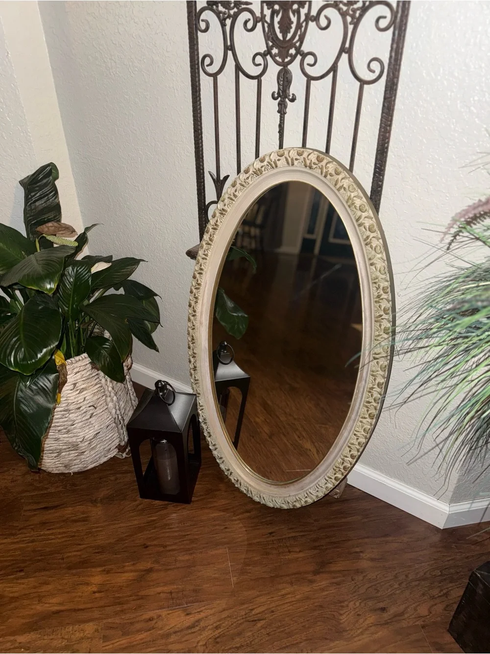 Vintage Oval Wall Mirror Featuring An Ornate, Off-White And Gold-Accented Frame